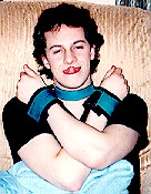 This one is Chris in teal bondage gear,
looking quite out of it.