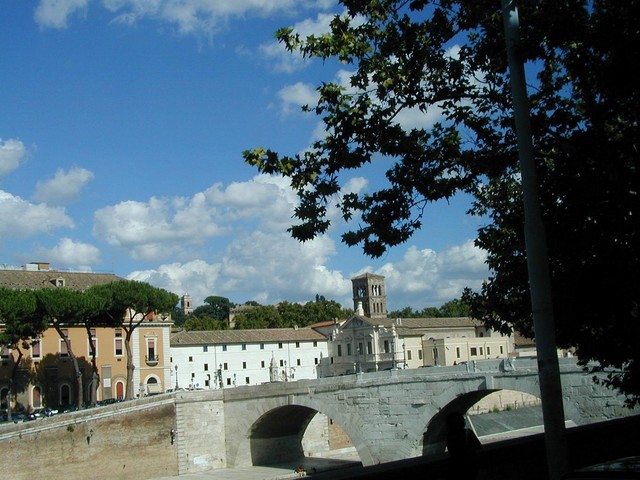 Bell tower behind Ponte Cestio bridge